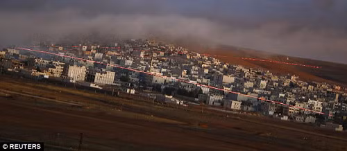 Hình ảnh không kích dữ dội nhằm vào IS ở Kobane ảnh 1
