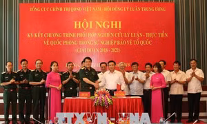 Ký kết chương trình phối hợp nghiên cứu lý luận - thực tiễn về quốc phòng