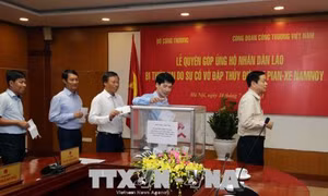 Gần 1,9 tỷ đồng hỗ trợ nhân dân Lào bị thiệt hại do vỡ đập thủy điện Sepien-Senamnoi