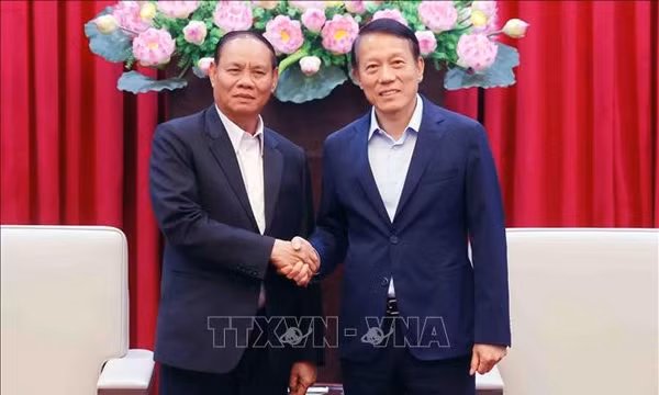 Bộ trưởng Lương Tam Quang tiếp Thường trực Ban Bí thư Lào