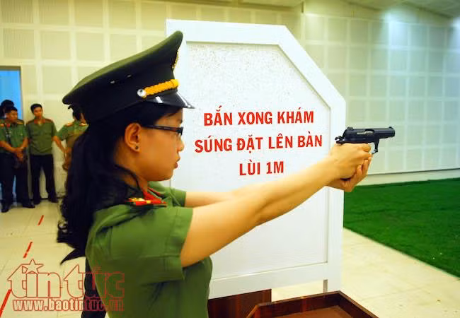 Ngắm các chiến sĩ công an tranh tài bắn súng ngắn quân dụng ảnh 4