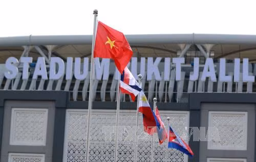 Quốc kỳ Việt Nam tung bay trong Lễ thượng cờ SEA Games 29 ảnh 1
