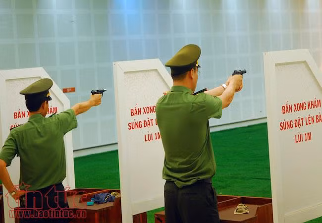 Ngắm các chiến sĩ công an tranh tài bắn súng ngắn quân dụng ảnh 3