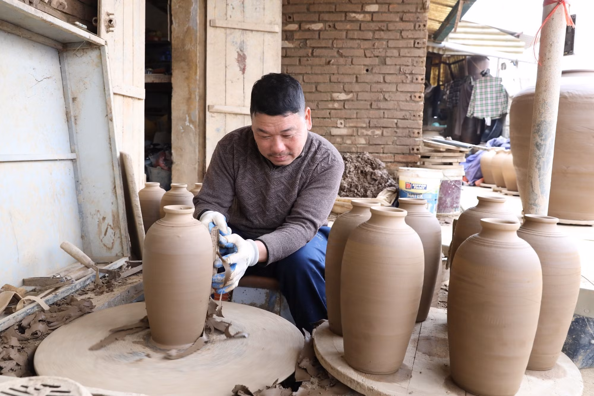 potal-ninh-binh-lang-gom-gia-thuy-giu-lua-xuyen-tet-7825326.jpg