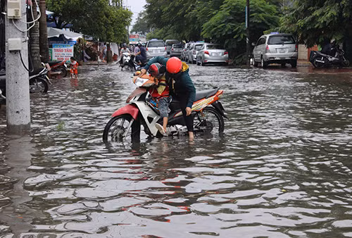 Thành phố Cà Mau ngập trong nước ảnh 1