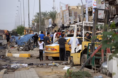 Đánh bom hàng loạt ở Iraq, hơn 130 người thương vong ảnh 1