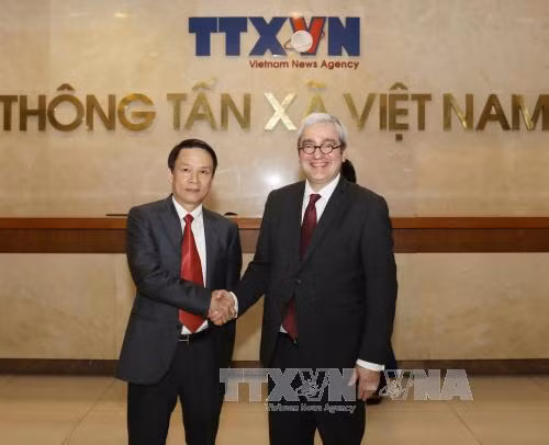 Tổng Giám đốc TTXVN tiếp Chủ tịch, Giám đốc điều hành hãng AFP ảnh 1
