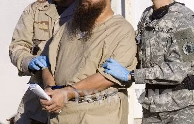 Sắp rời Nhà Trắng, ông Obama quyết chuyển tù nhân khỏi Guantanamo ảnh 1