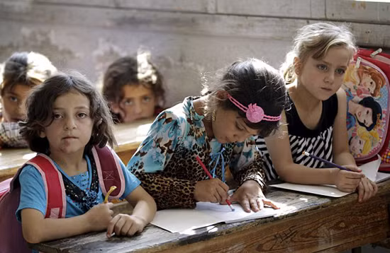 Lớp học trong vùng chiến sự ở Syria ảnh 3