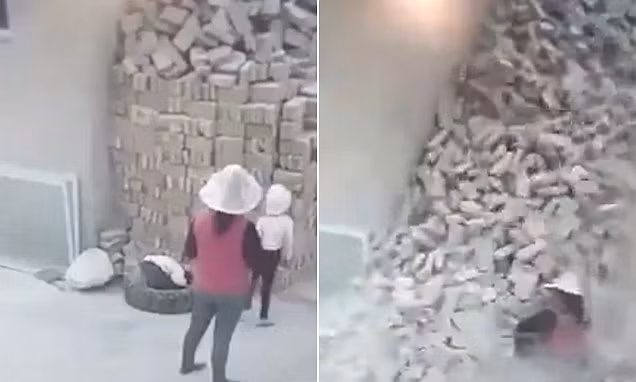 Bị đống gạch cao 2m chôn vùi, hai em bé may mắn sống sót ảnh 1