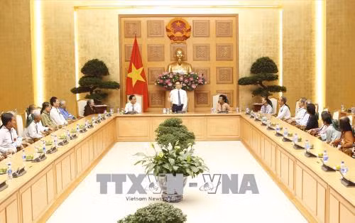 Phó Thủ tướng Vũ Đức Đam tiếp đoàn đại biểu người có công tỉnh Tiền Giang ảnh 1