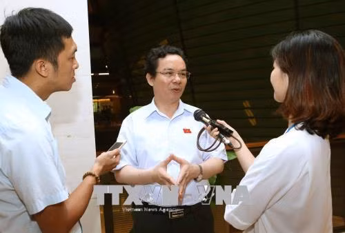 Đại biểu Quốc hội chưa thoả mãn phần trả lời của Bộ trưởng Bộ Giao thông Vận tải ảnh 1