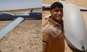 Dân Iraq selfie bên xác máy bay không người lái Mỹ