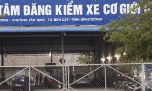 Phong tỏa, khám xét một trung tâm đăng kiểm tại Bình Dương