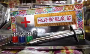 Vàng mã vaccine COVID-19 đắt khách tại Malaysia