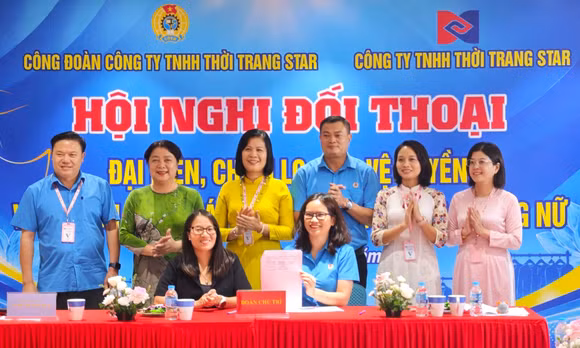 Lễ ký kết biên bản thoả thuận chăm lo đời sống người lao động.