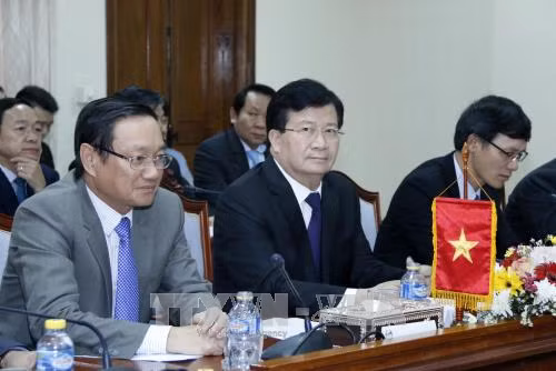 Phó Thủ tướng Trịnh Đình Dũng làm việc về Dự án nhà Quốc hội Lào ảnh 1