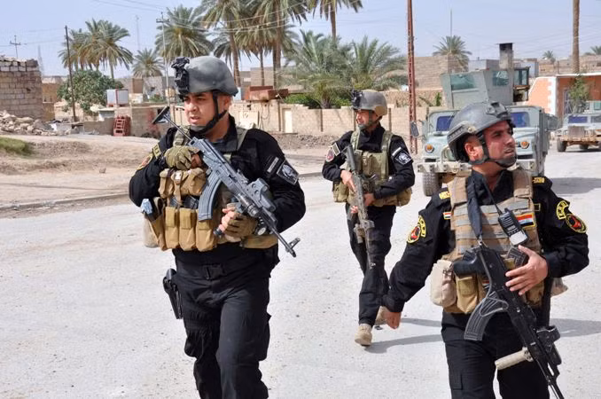 Phiến quân Iraq tấn công căn cứ không quân và chiếm mỏ dầu ảnh 1